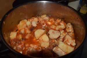 Potato and Chicken Curry being cooked